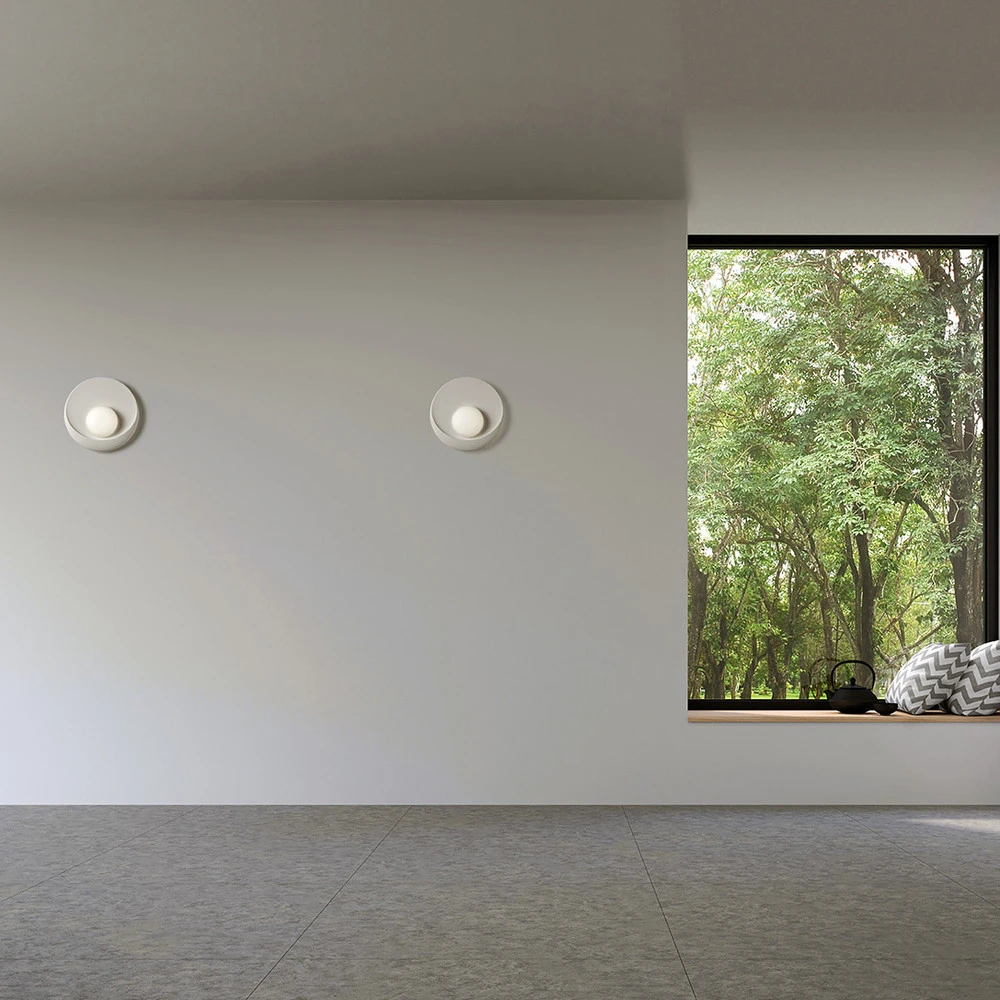 Applique murale Pitane, Ø 25 cm, blanc, plâtre, GX53 en laiton brossé