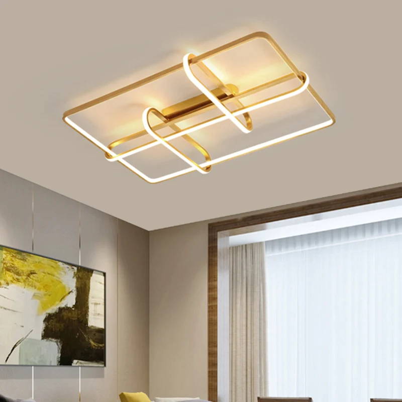 Éclairage de plafond LED doré minimaliste à montage encastré avec cadre rectangulaire en acrylique avec un design oblong p...