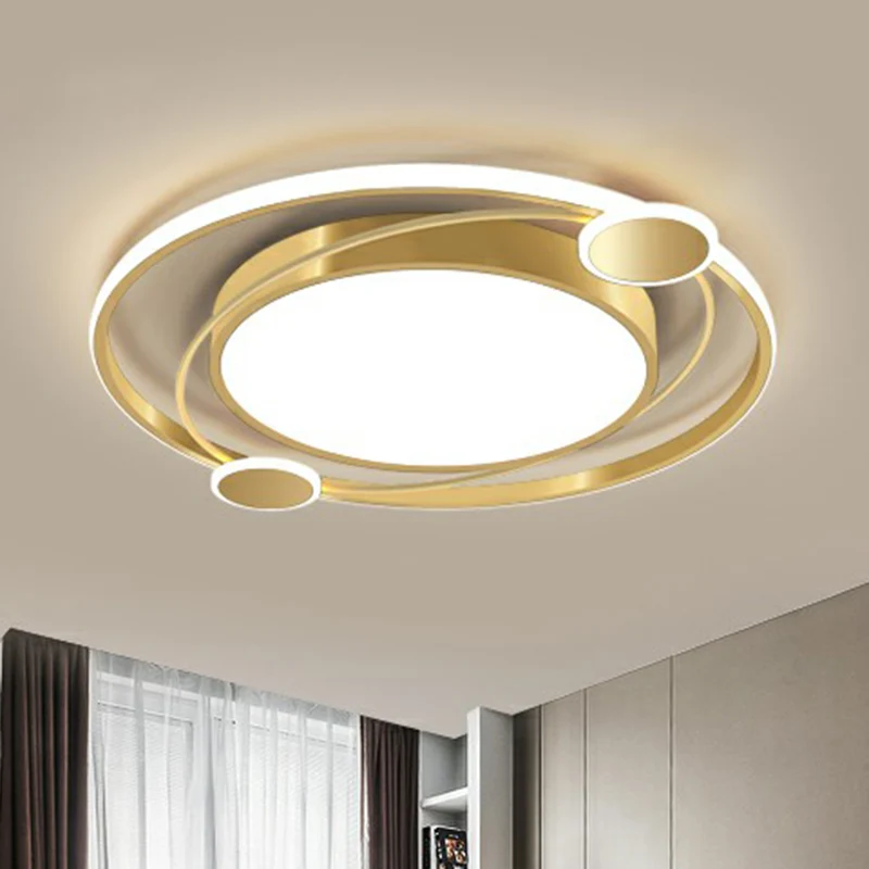 Plafonnier LED circulaire en métal, finition dorée minimaliste, luminaire décoratif de plafond, idéal pour une chambre à c...