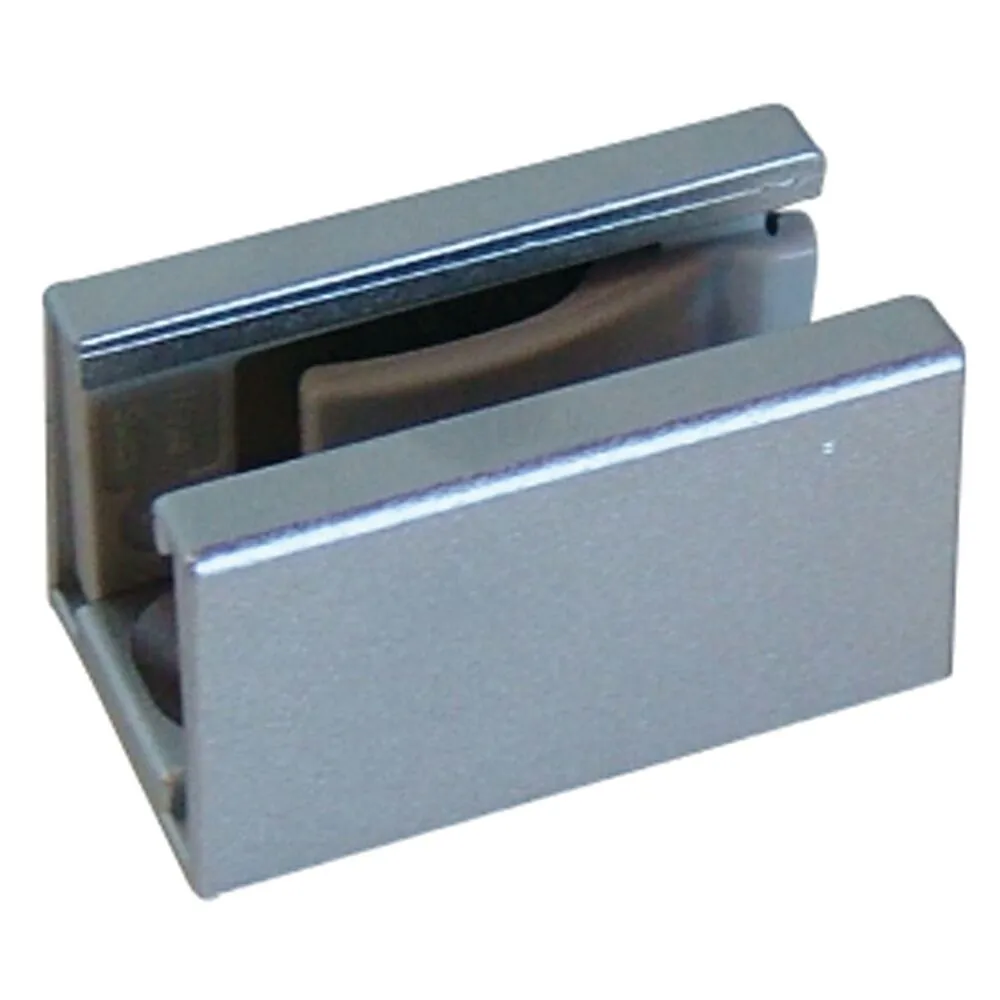 Guide inférieur auto-serrant exhaustif