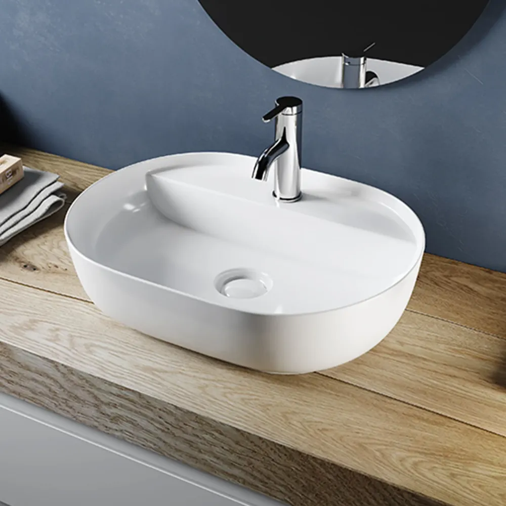 Lavabo à poser ovale en céramique blanc brillant série DRV cm 60,5x40 avec trou pour robinetterie